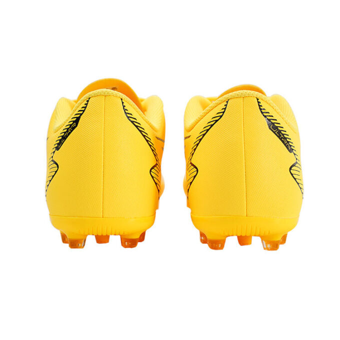Buty piłkarskie Ultra Play MG w kolorze żółto-białym