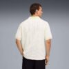 Dzianinowa koszulka polo PUMA x MADHAPPY Dzianinowa koszulka polo PUMA x MADHAPPY