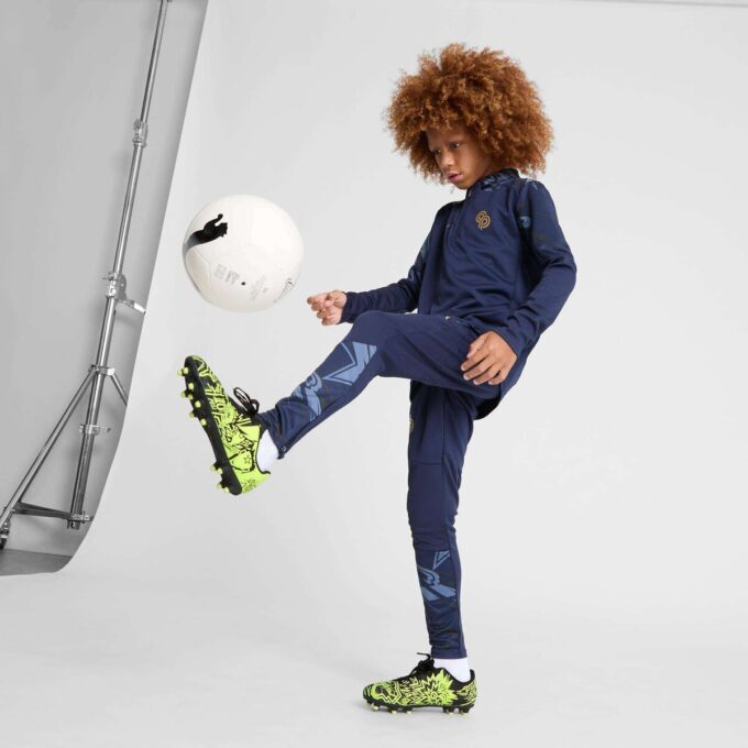 PUMA x CHRISTIAN PULISIC TACTO II dziecięce buty piłkarskie na twardą/sztuczną murawę PUMA x CHRISTIAN PULISIC TACTO II dziecięce buty piłkarskie na twardą/sztuczną murawę