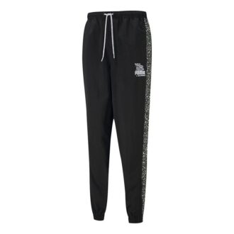 Spodnie sportowe PUMA x Mr Doodle Crossover Graffiti Drawstring Woven Long Pants w kolorze czarnym