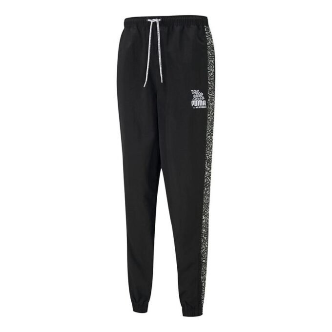 Spodnie sportowe PUMA x Mr Doodle Crossover Graffiti Drawstring Woven Long Pants w kolorze czarnym