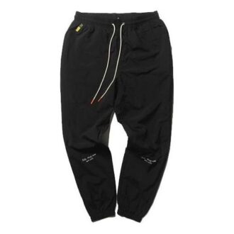 Spodnie tkane PUMA x Randomevent w kolorze czarnym