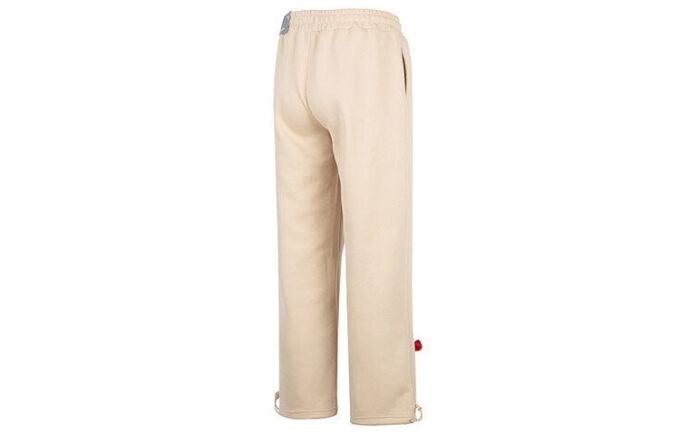 Spodnie z prostą nogawką i odznaką drużyny „Beżowe”
